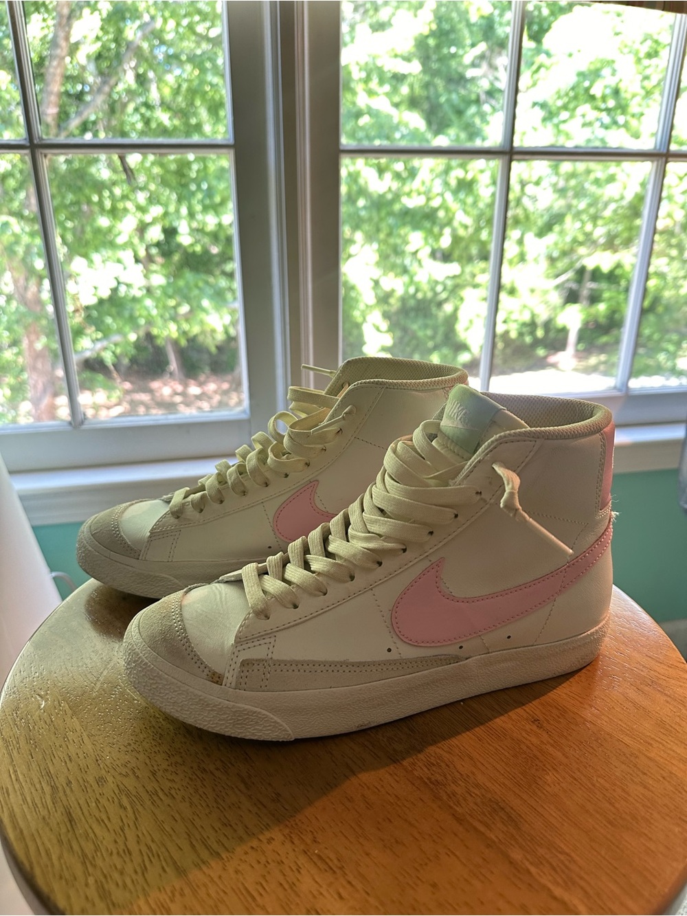 Nike Women's Cream High-Top Sneakers with Pink Swoosh Accent